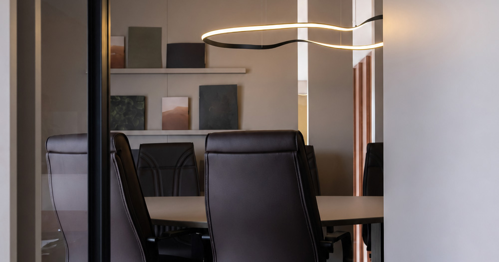 Modern conference room with executive seating, representing strategic tax planning before significant financial decisions and transactions.